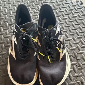 Hoka Black and White Women’s track shoes with Neon Accents